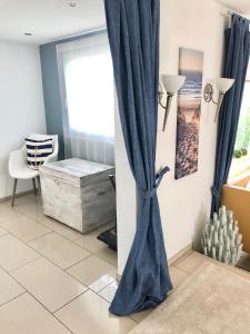 Posezení v ubytování Ferienhaus direkt am See