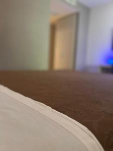 Postel nebo postele na pokoji v ubytování L'Isola che non c'è