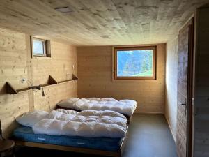 Tempat tidur dalam kamar di Le mayen de François