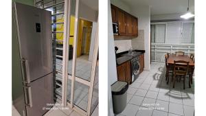 a kitchen with a refrigerator and a kitchen with a table at Appartement en résidence avec piscine in Le Gosier