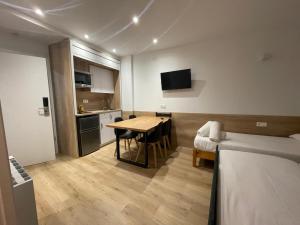Posteľ alebo postele v izbe v ubytovaní Apartamentos La Solana