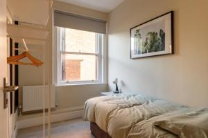 Letto o letti in una camera di Dublin Castle Suites