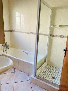 Vonios kambarys apgyvendinimo įstaigoje Celtis Lane Guest House