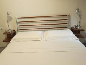 Postel nebo postele na pokoji v ubytování A casa di Enrico e LuzMe