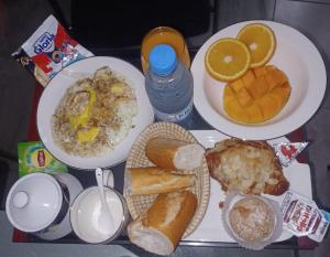 a tray of food with plates of breakfast foods at Keur GORA, Sacré cœur 2 in Dakar