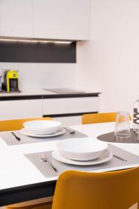 Η κουζίνα ή μικρή κουζίνα στο CityU Grazioli 27 Appartamento Trento Città - 2 stanze con 2 parcheggi privati gratuiti