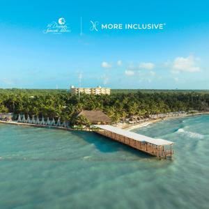 an island with a pier in the water at El Dorado Seaside Palms A Spa Resort - More Inclusive in Akumal