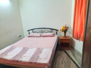 Ένα ή περισσότερα κρεβάτια σε δωμάτιο στο Two Bedroom Independent Als Home