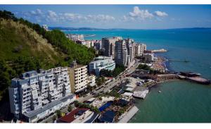 an aerial view of a city next to the water at Durres Currila RELAX Beach Lifestyle in Durrës