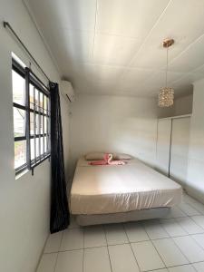 Giường trong phòng chung tại Kenepa Resort