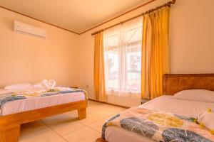 Ένα ή περισσότερα κρεβάτια σε δωμάτιο στο Casa Stela +42 φωτογραφίες