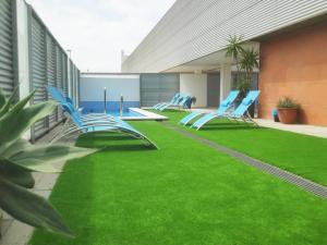Κήπος έξω από το Apartamentos ALAZUL Lofts