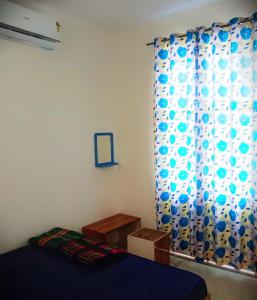 Lova arba lovos apgyvendinimo įstaigoje Bhakti Home stay
