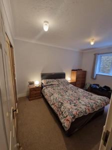 Ένα ή περισσότερα κρεβάτια σε δωμάτιο στο Duplex flat in Cirencester free parking and WiFi