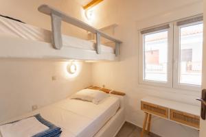 Posteľ alebo postele v izbe v ubytovaní Eressian Lodgings - Skala Eressos