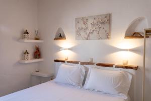 Posteľ alebo postele v izbe v ubytovaní Eressian Lodgings - Skala Eressos