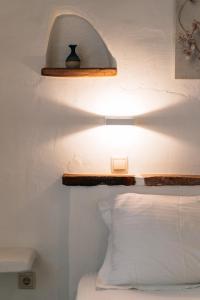 Posteľ alebo postele v izbe v ubytovaní Eressian Lodgings - Skala Eressos