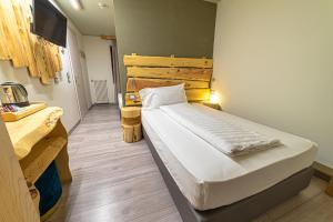 Posteľ alebo postele v izbe v ubytovaní Chalet Margoni