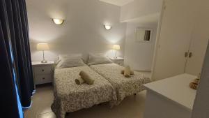 Posteľ alebo postele v izbe v ubytovaní Mar del Sur