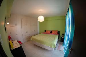 Una cama o camas en una habitación de Laconic bay view suite