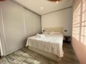 Katil atau katil-katil dalam bilik di Céntrico Apartmento
