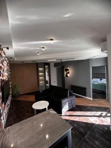Posezení v ubytování Garden Lounge Hotel