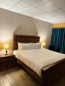 Cama o camas de una habitación en Infinity Villa and Resort Kumrat Valley