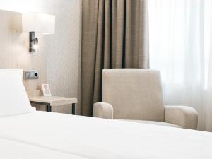 Postel nebo postele na pokoji v ubytování Hotel Albret