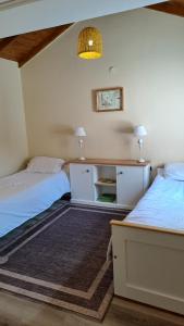 En eller flere senge i et værelse på La casa de techo turquesa