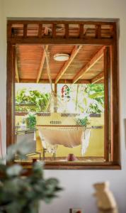 eine Spiegelreflexion einer Hängematte in der Unterkunft Casa de Campo Vista Hermosa in Lares