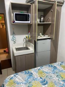 Kuchyň nebo kuchyňský kout v ubytování Onatacondotel