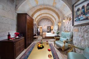 A seating area at Cappadocia Pegasos Cave Suite Hotel