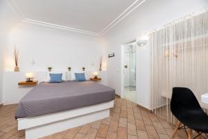 Postel nebo postele na pokoji v ubytování Seaside by Manos
