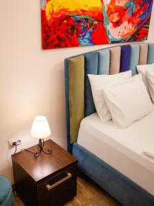 Colorway Apartment 객실 침대