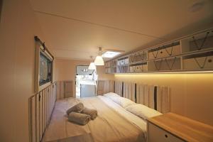 Postel nebo postele na pokoji v ubytování Riva di Ugento Beach Camping Resort