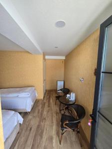 Letto o letti in una camera di KHORGO