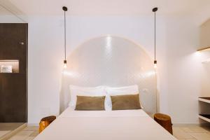 Postel nebo postele na pokoji v ubytování Dirium - exclusive rooms