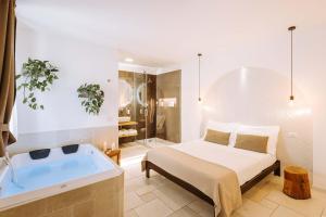 Postel nebo postele na pokoji v ubytování Dirium - exclusive rooms