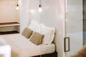 Postel nebo postele na pokoji v ubytování Dirium - exclusive rooms