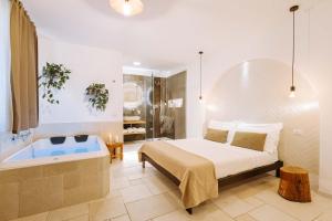 Postel nebo postele na pokoji v ubytování Dirium - exclusive rooms