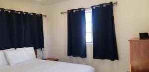 Katil atau katil-katil dalam bilik di 075A Affordable Getaway near South Rim Sleeps 2
