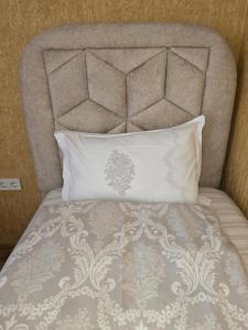 Letto o letti in una camera di KHORGO