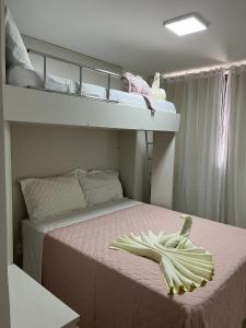 En eller flere senge i et værelse på Oka Flat Muro Alto
