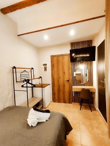 Poseidon Rooms客房内的一张或多张床位