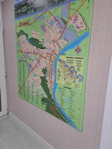 a map is hanging on a wall at Villa de Nord in Soroca