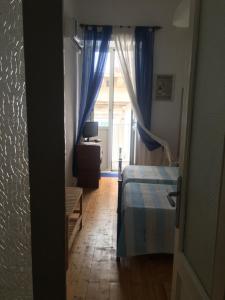 Postel nebo postele na pokoji v ubytování B&B Domus Gaetani