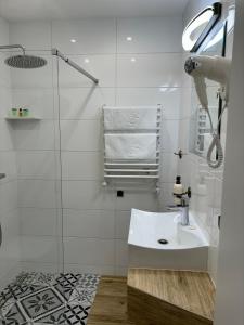 Koupelna v ubytování Apartamenty Grodowa 2