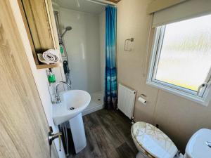 Koupelna v ubytování Rosa - Bournemouth Holiday Home