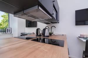 Η κουζίνα ή μικρή κουζίνα στο Laki 24 Apartments by EasyRentals