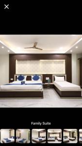una imagen de una suite familiar con 2 camas en HOTEL SAGUN, en Jaipur